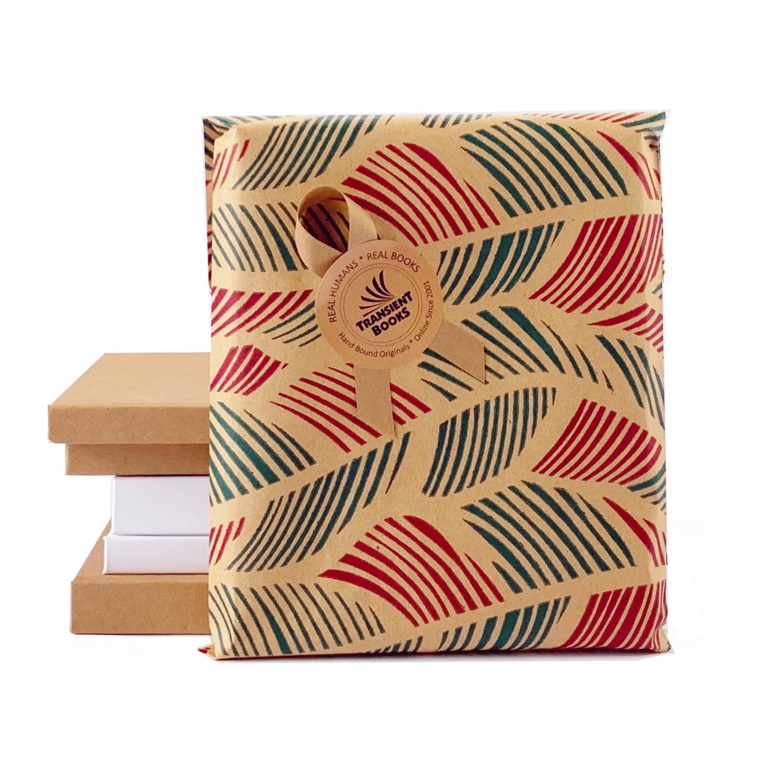 Beautifully gift wrapped book with a ribbon, a perfect upgrade for personalized handbound books.