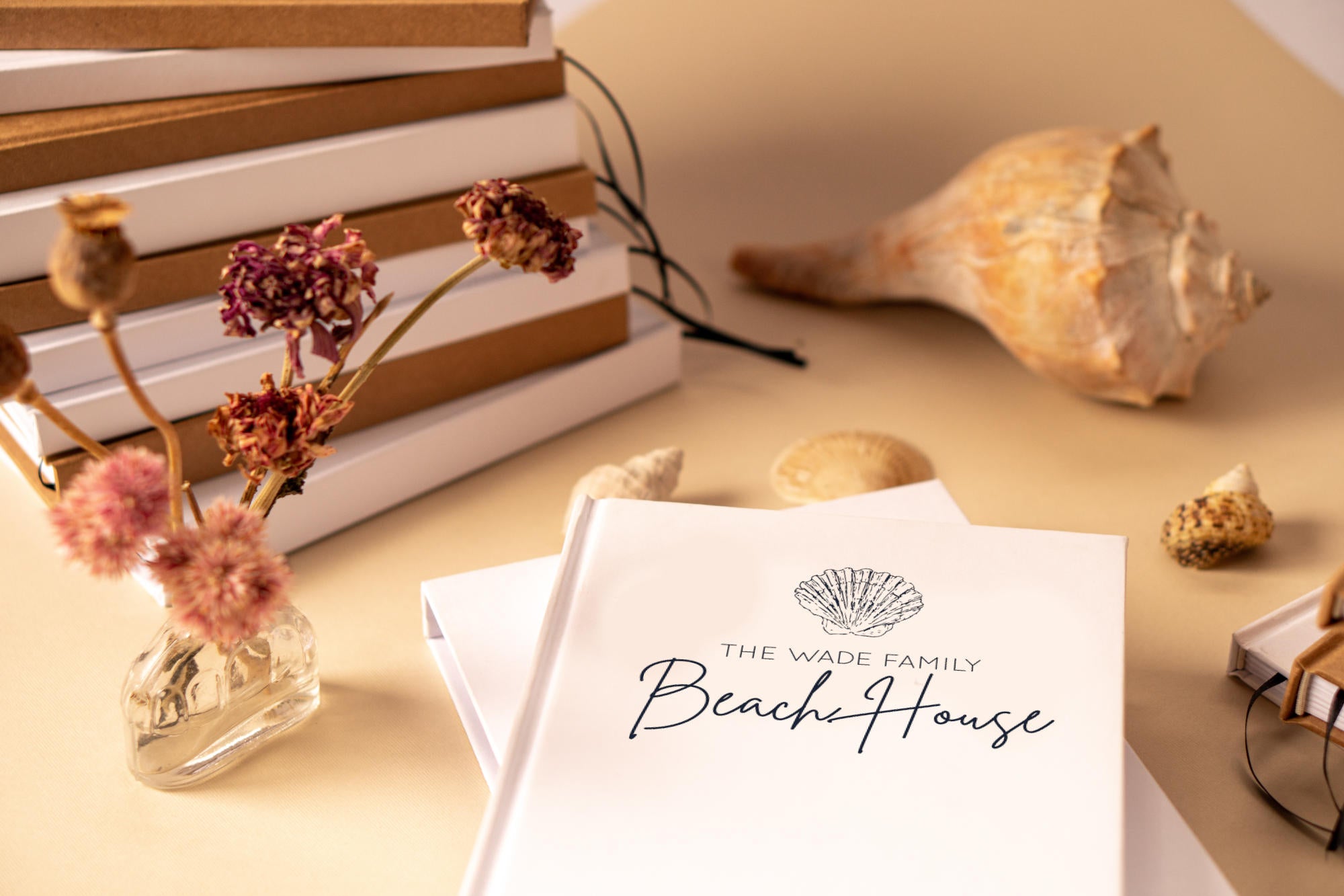 Beach house guest book displayed on a welcome table, ready for guests to sign and share memories.