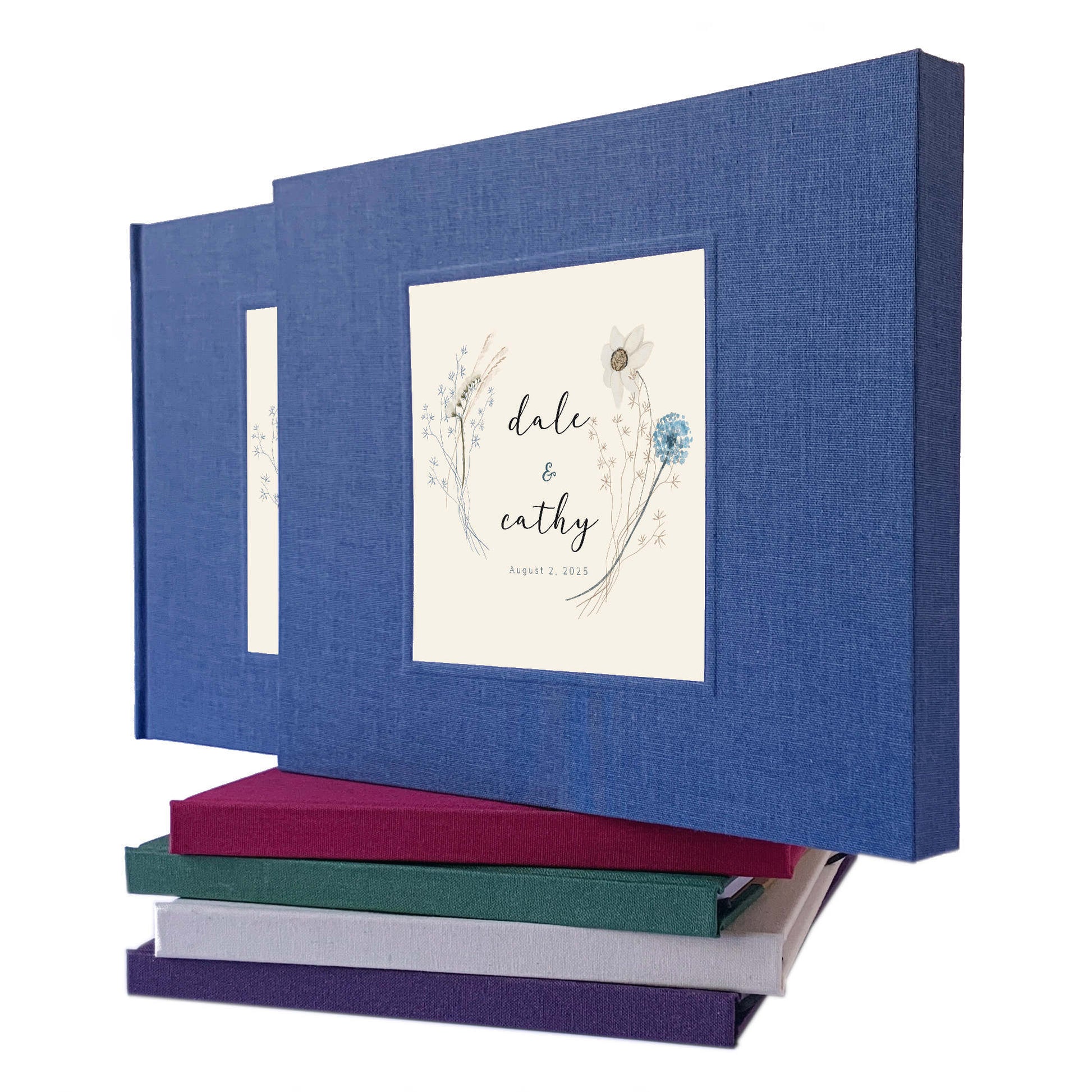 boho wedding guest book in navy blue linen, wildflower design customized on cover. hand bound heirloom quality bridal memory book in a book slipcase.