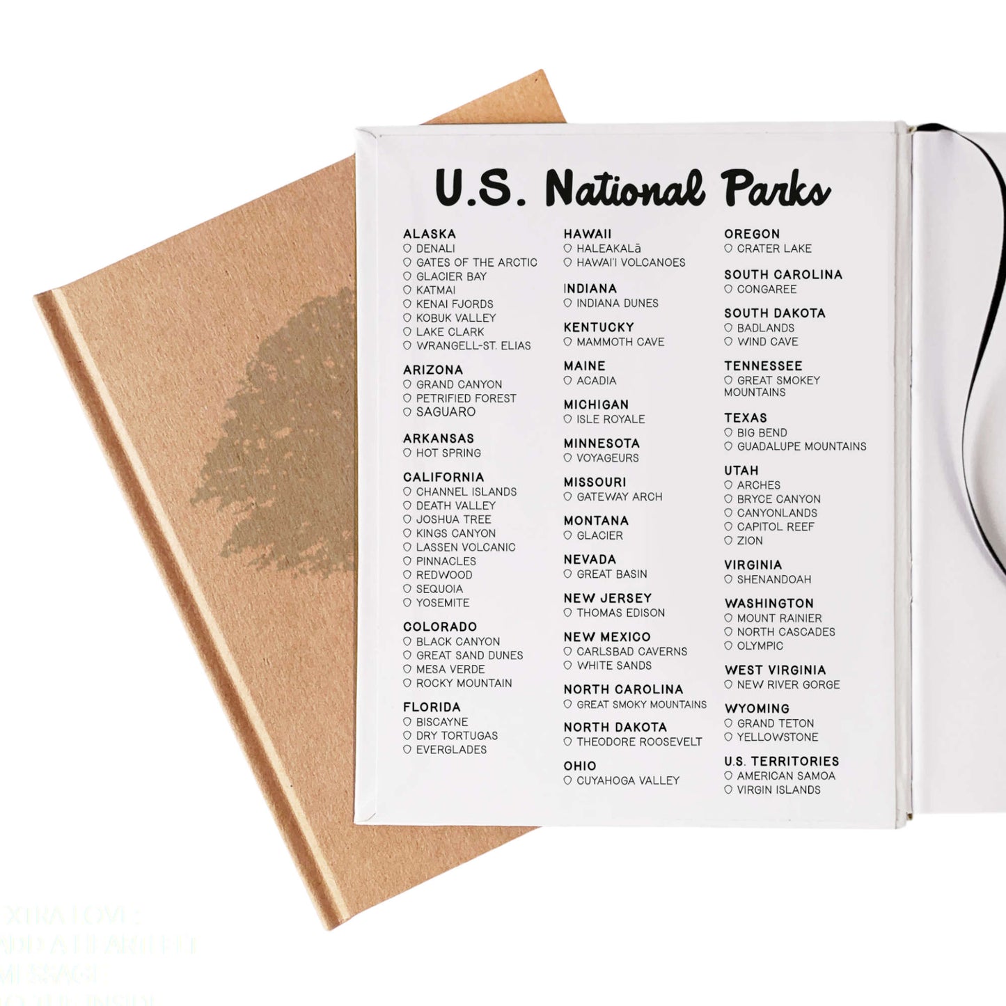 Personalized National Parks journal open to checklist of U.S. National Parks on inside front cover.
