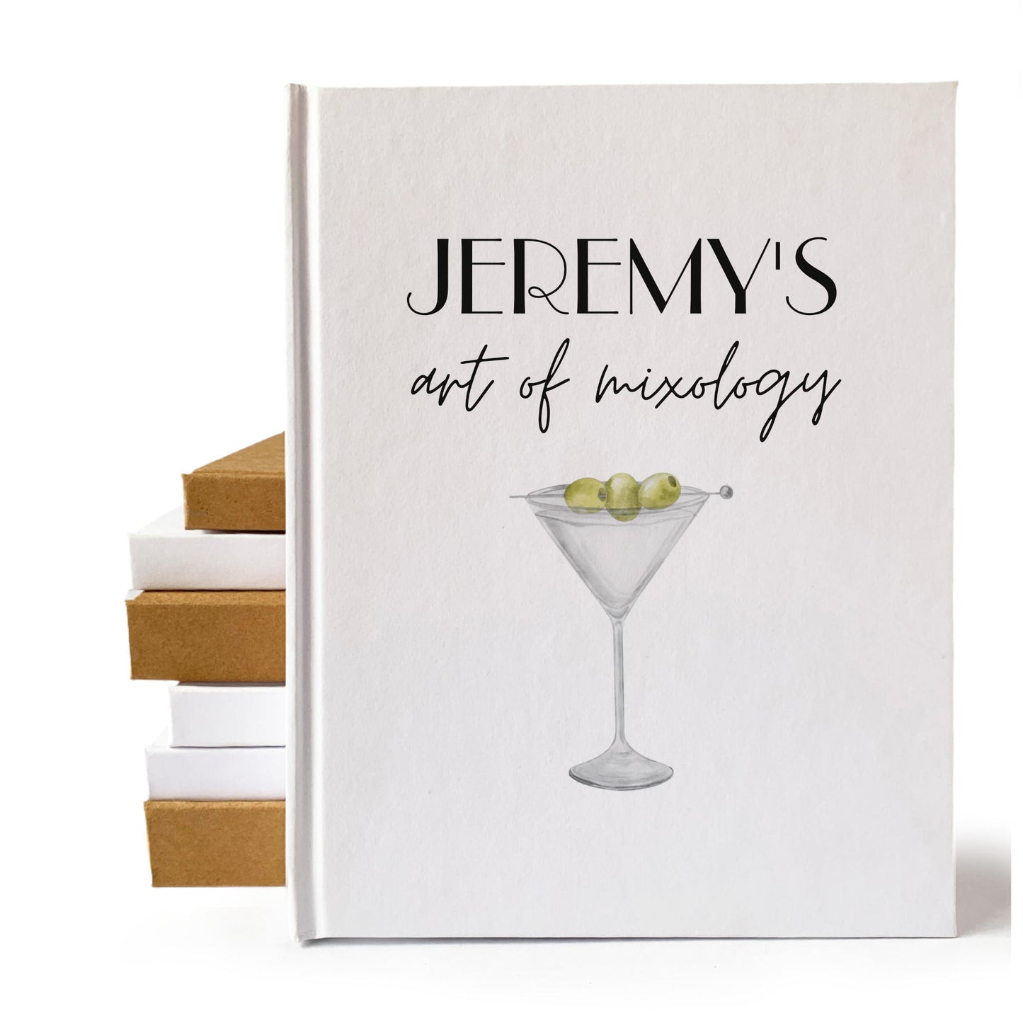 White custom cocktail book with personalized text and martini artwork on the cover. Heirloom quality gift for bartender.