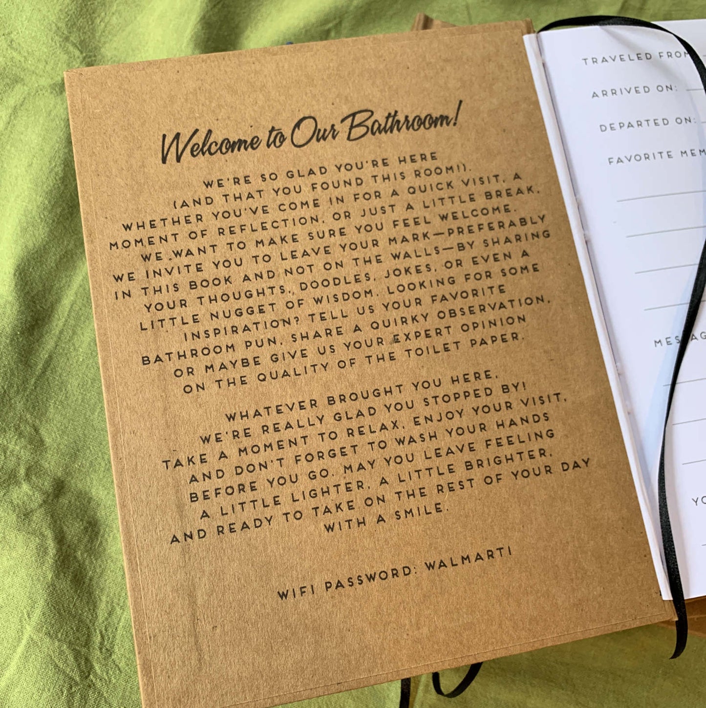 a very funny welcome message on the inside front cover of a custom guest book made for a bathroom
