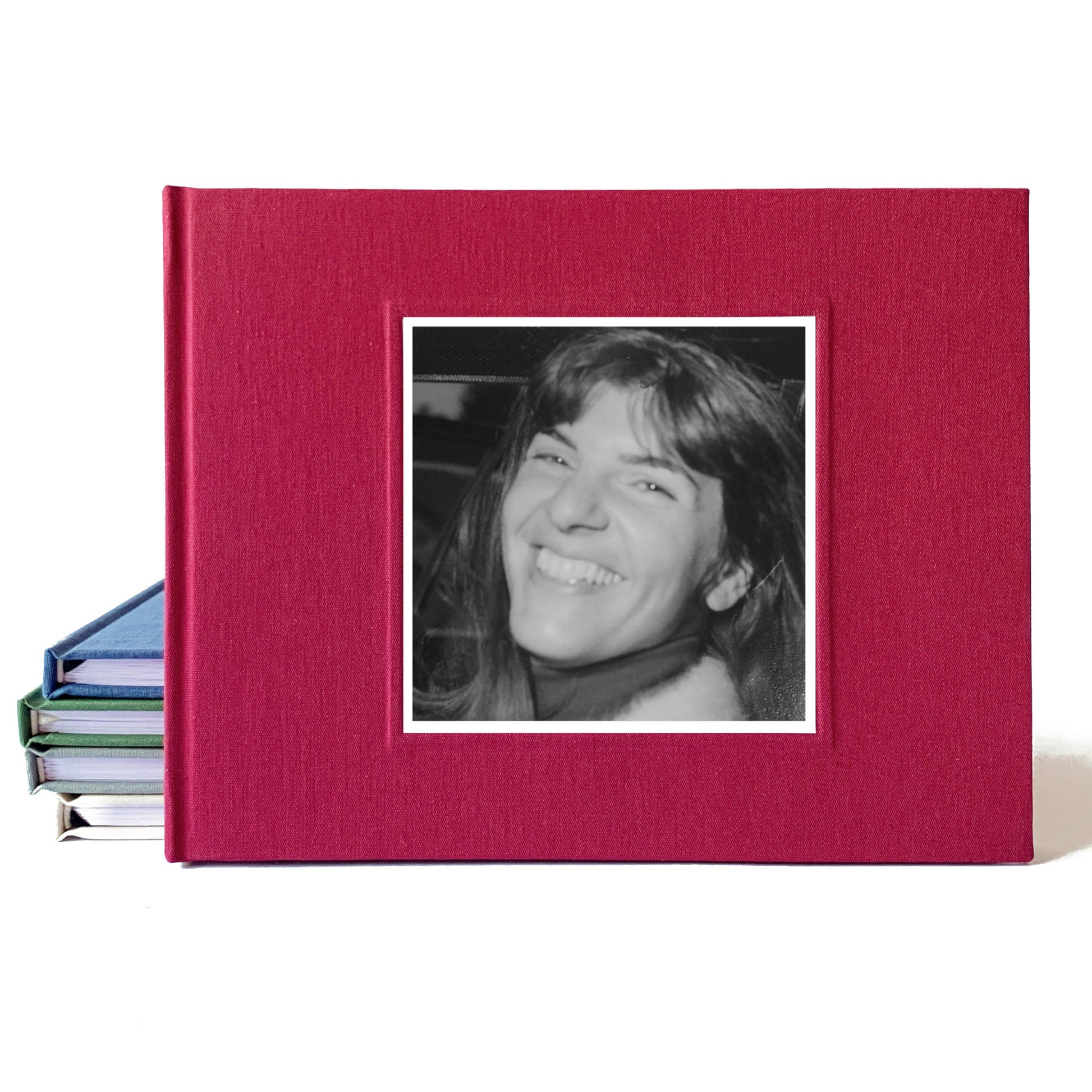 Burgundy funeral guest book with photo of the deceased on the cover. The hardback memorial service book is hand crafted, heirloom quality.