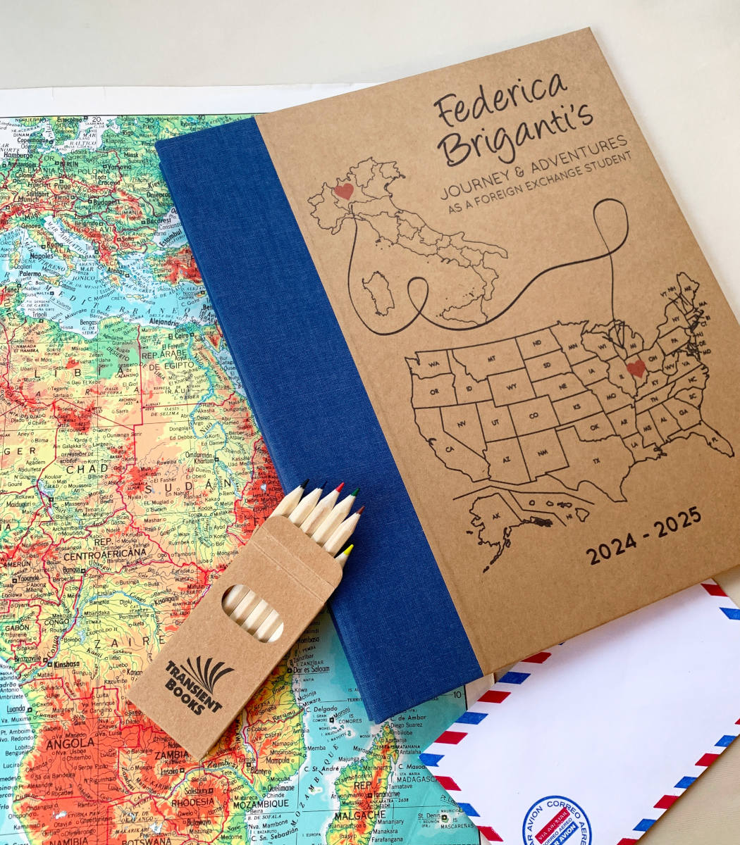 Travel Scrapbook with removable pages. Cover personalized with custom map you can color in.