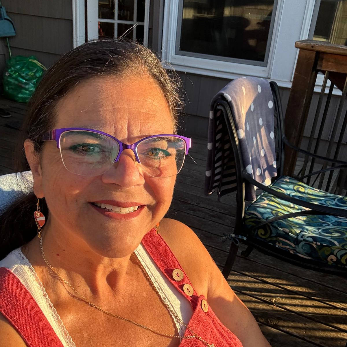 Smiling person who is happy to ship custom handbound books.