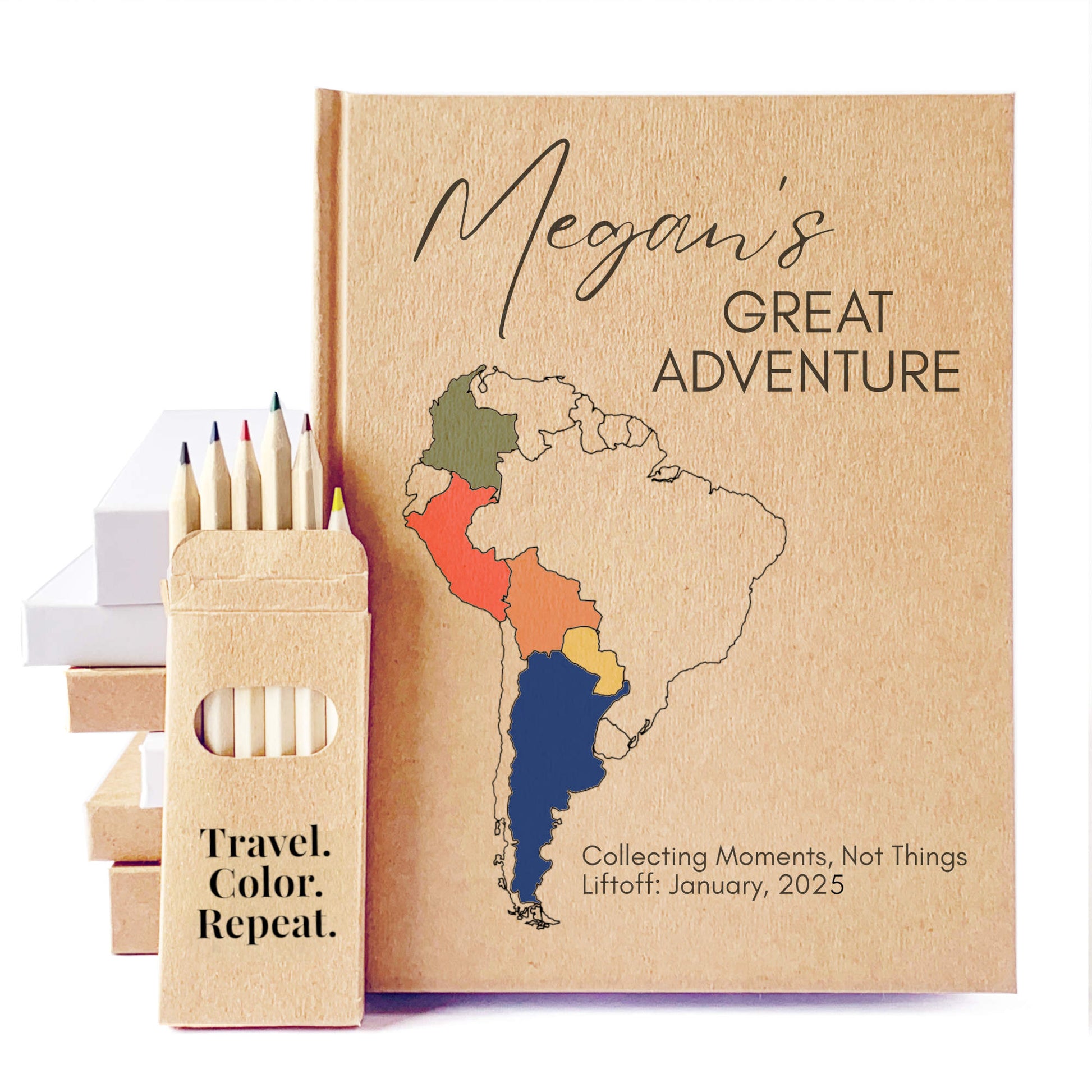 Personalized travel journal with custom map design and colored pencils on a white background. Handbound book, heirloom quality, made to order. Kraft cover paper, hardback.