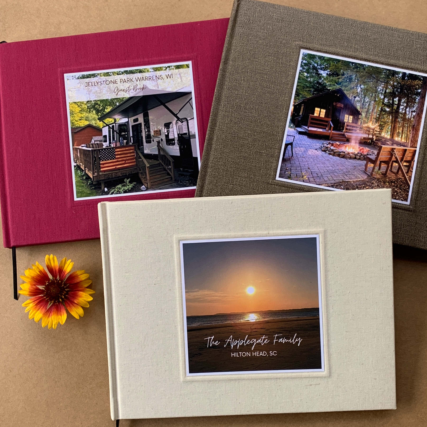 three Custom vacation home guest books with hardback linen covers and photo covers  for short term rental managers. 