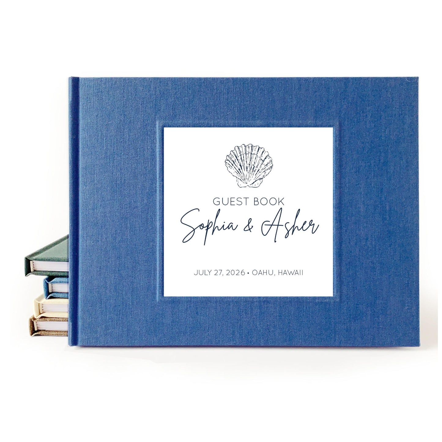 Custom beach wedding guest book with hardback blue linen cover and coastal design for engaged couple