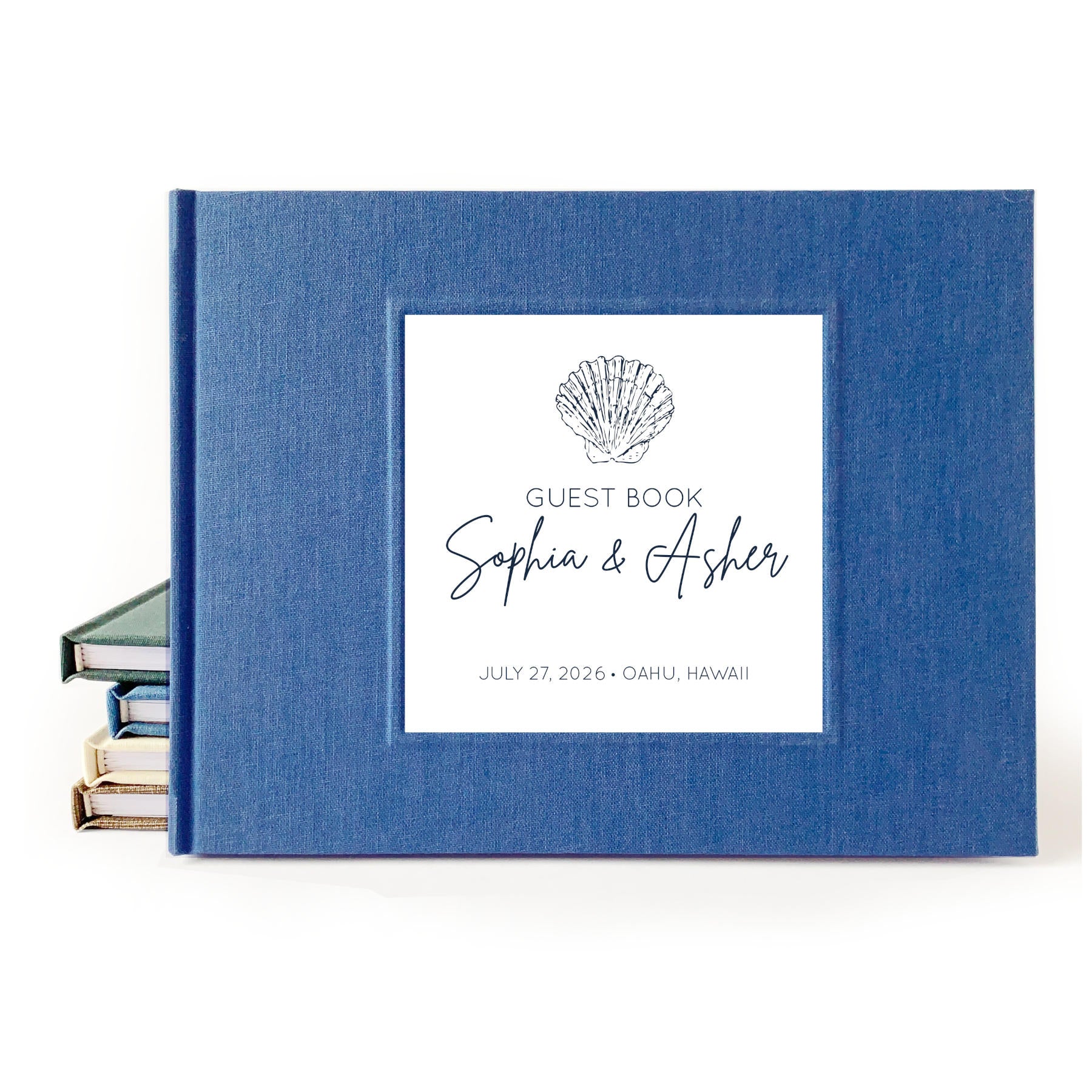 Custom beach wedding guest book with hardback blue linen cover and coastal design for engaged couple
