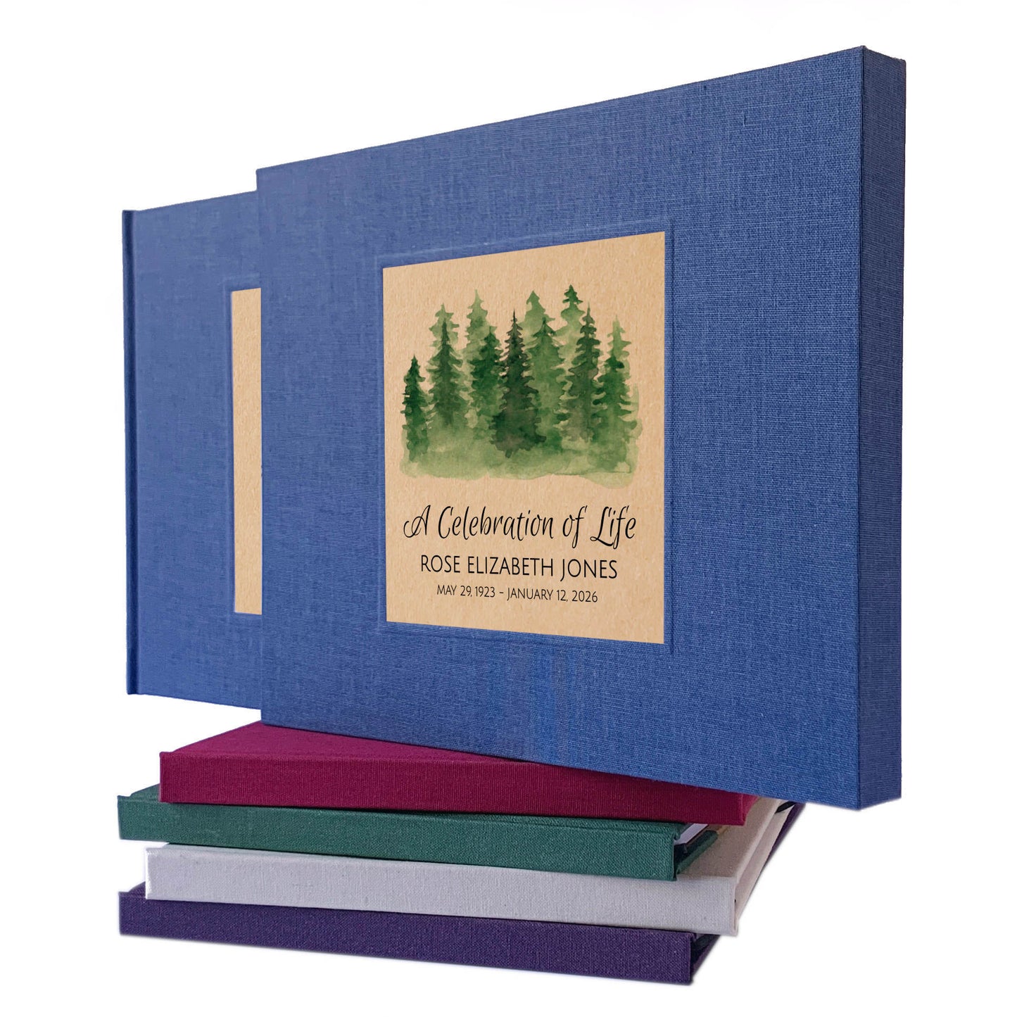 Blue linen celebration of life guest book in matching book slip case with a watercolor forest design and custom text on cover.