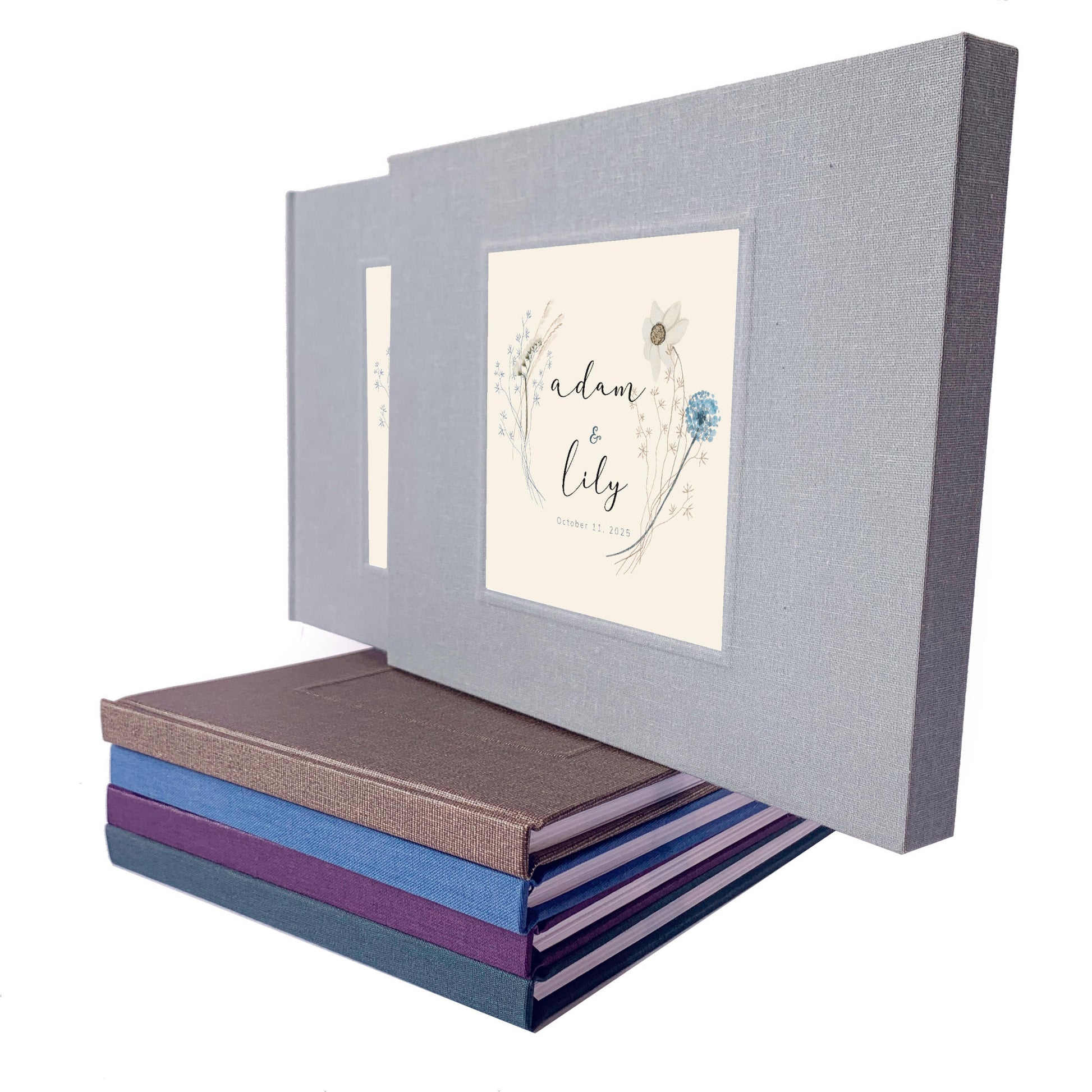 Boho wedding guest book with wildflower bouquet design on cover. Personalized with bride and groom's name and dates. Housed in matching book slipcase.