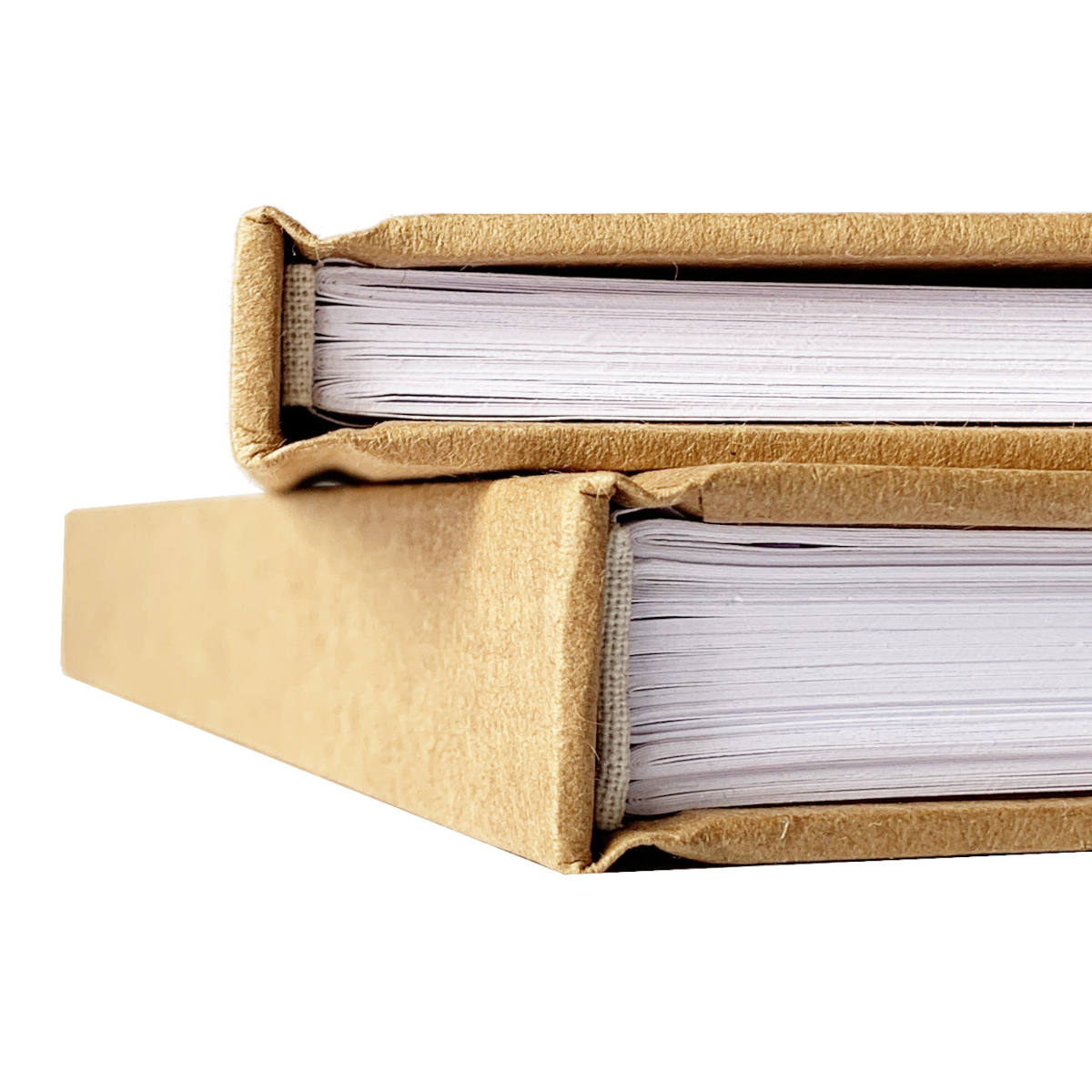 Closeup of handbound book spines displaying varying page counts. Quality craftsmanship with durable bindings.