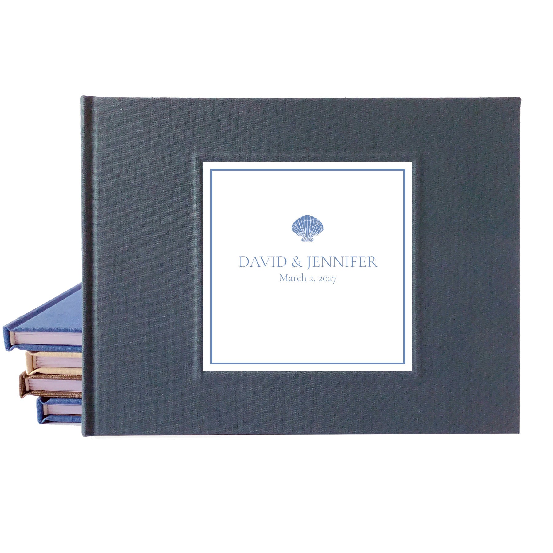 Dark gray linen wedding guest book for a coastal wedding with bride and groom's names and their wedding date on the cover.