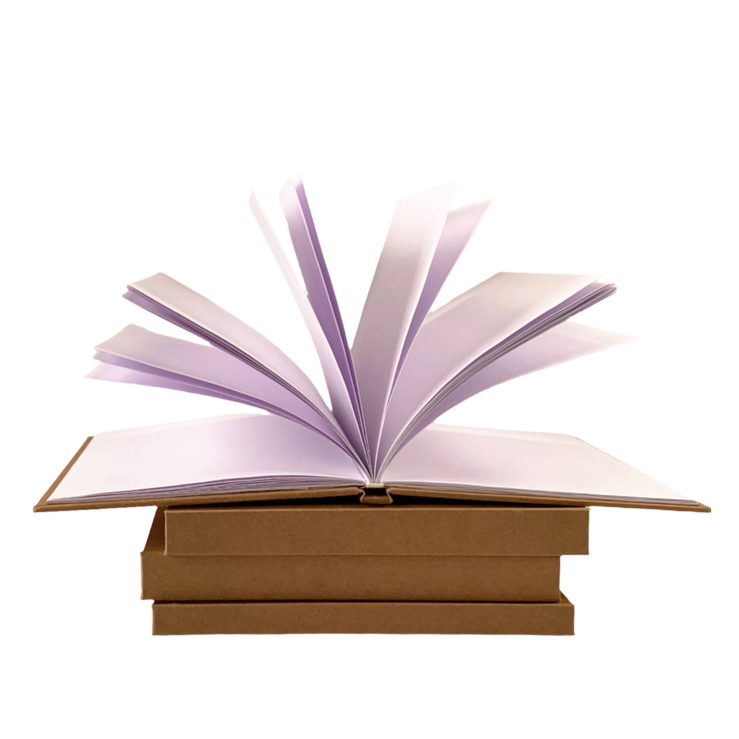 Open custom journal with fanning pages pointing upwards, stacked on hand crafted journals beneath.