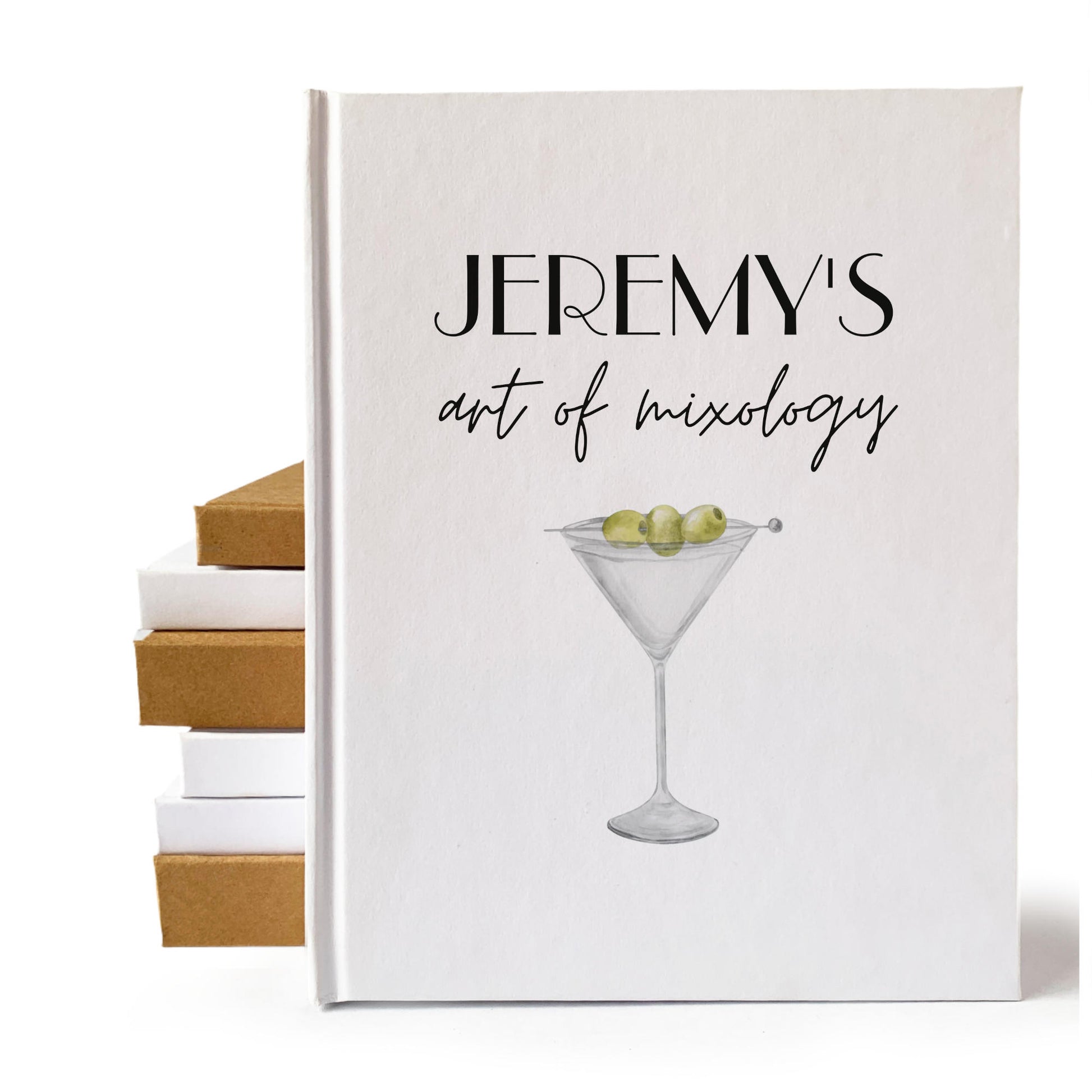 White custom cocktail book with personalized text and martini artwork on the cover. Heirloom quality gift for bartender.