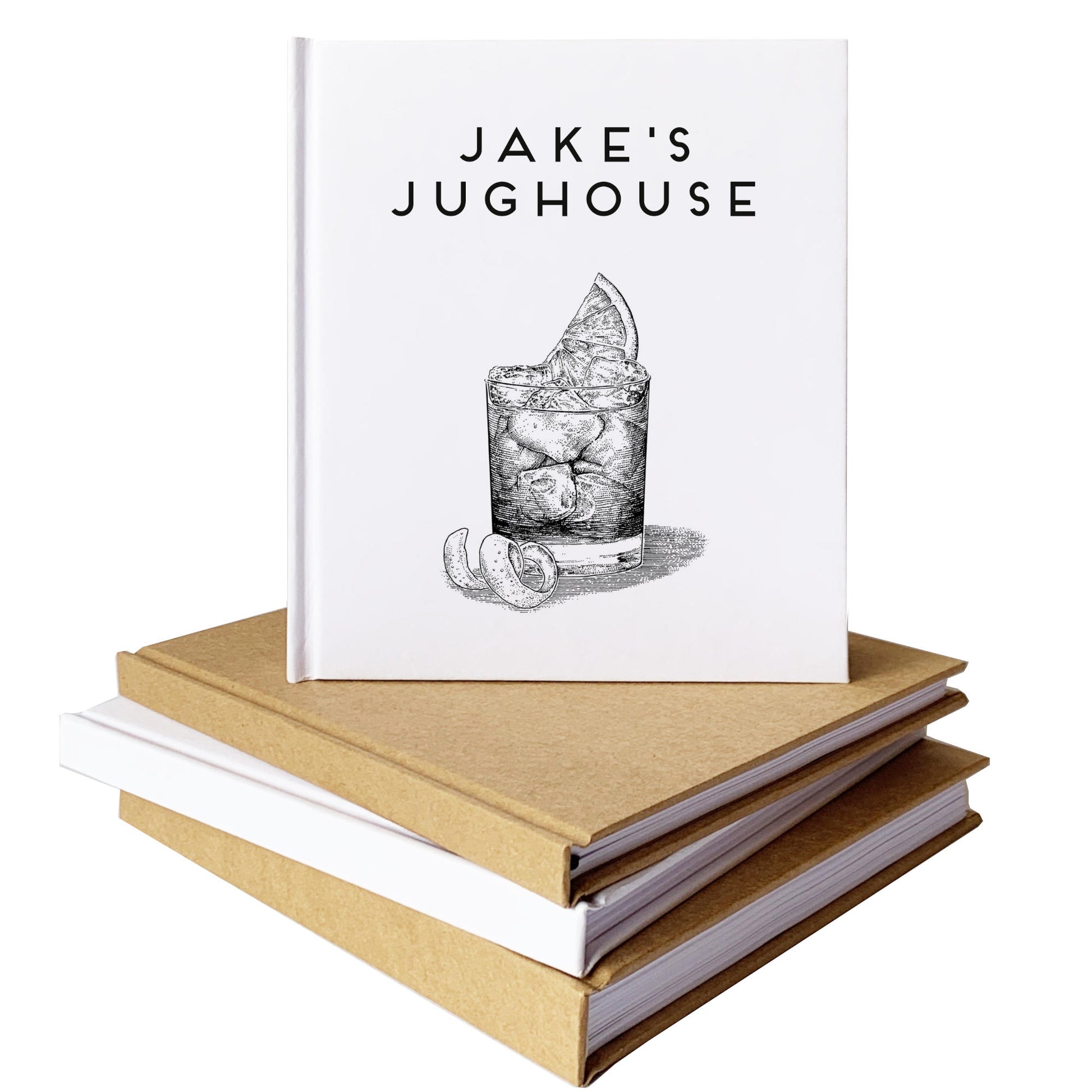 A custom cocktail book with personalized text and negroni illustration on cover, set on top of a stack of handbound notebooks.