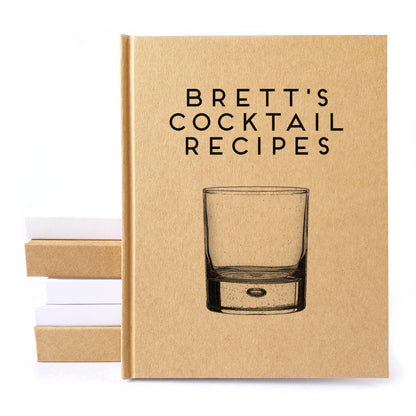 Custom cocktail book with a low ball glass on the cover and personalized text. Hardback, made to order, heirloom quality.