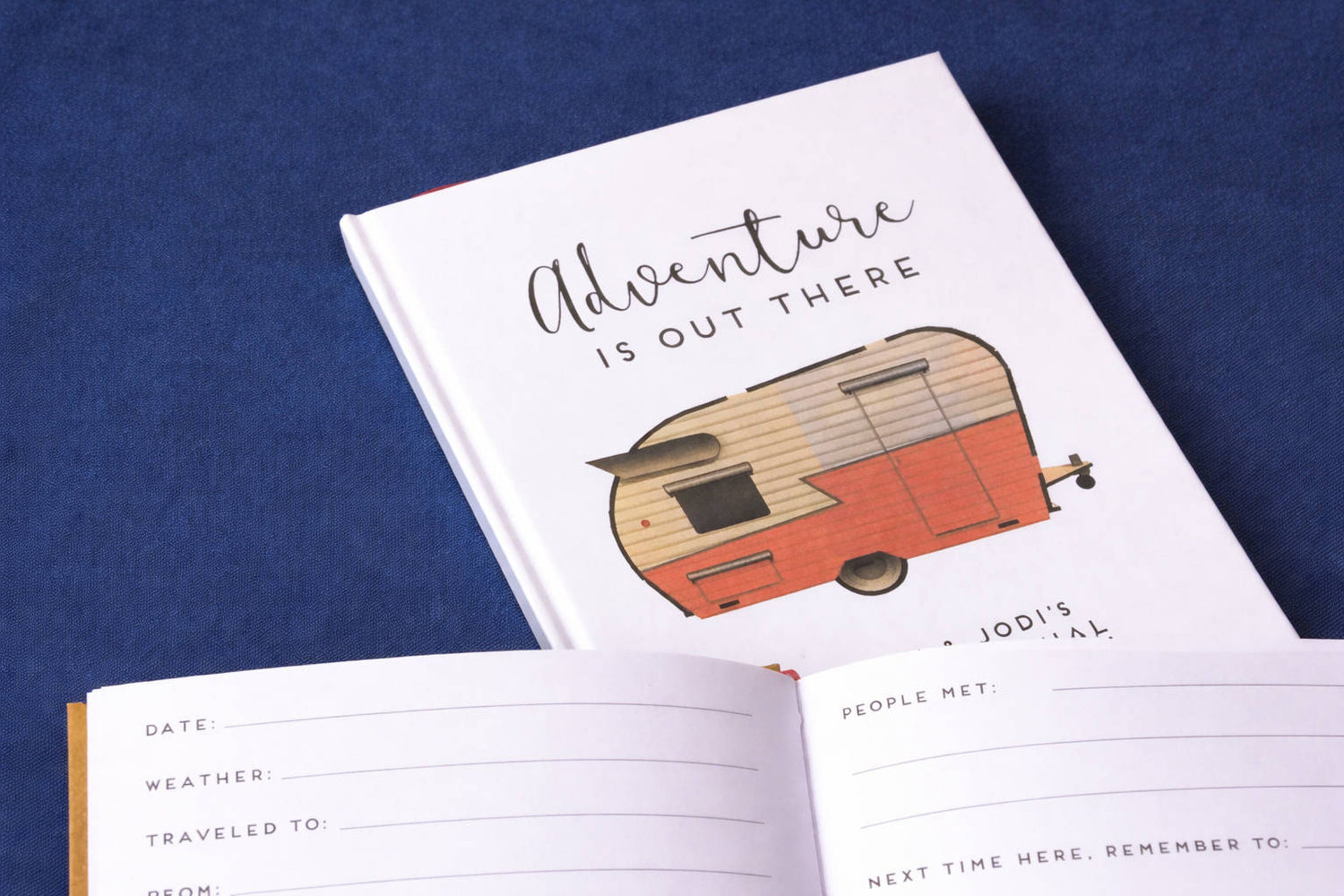 Custom rv travel log with hardback white cover for gifting to rv owners.