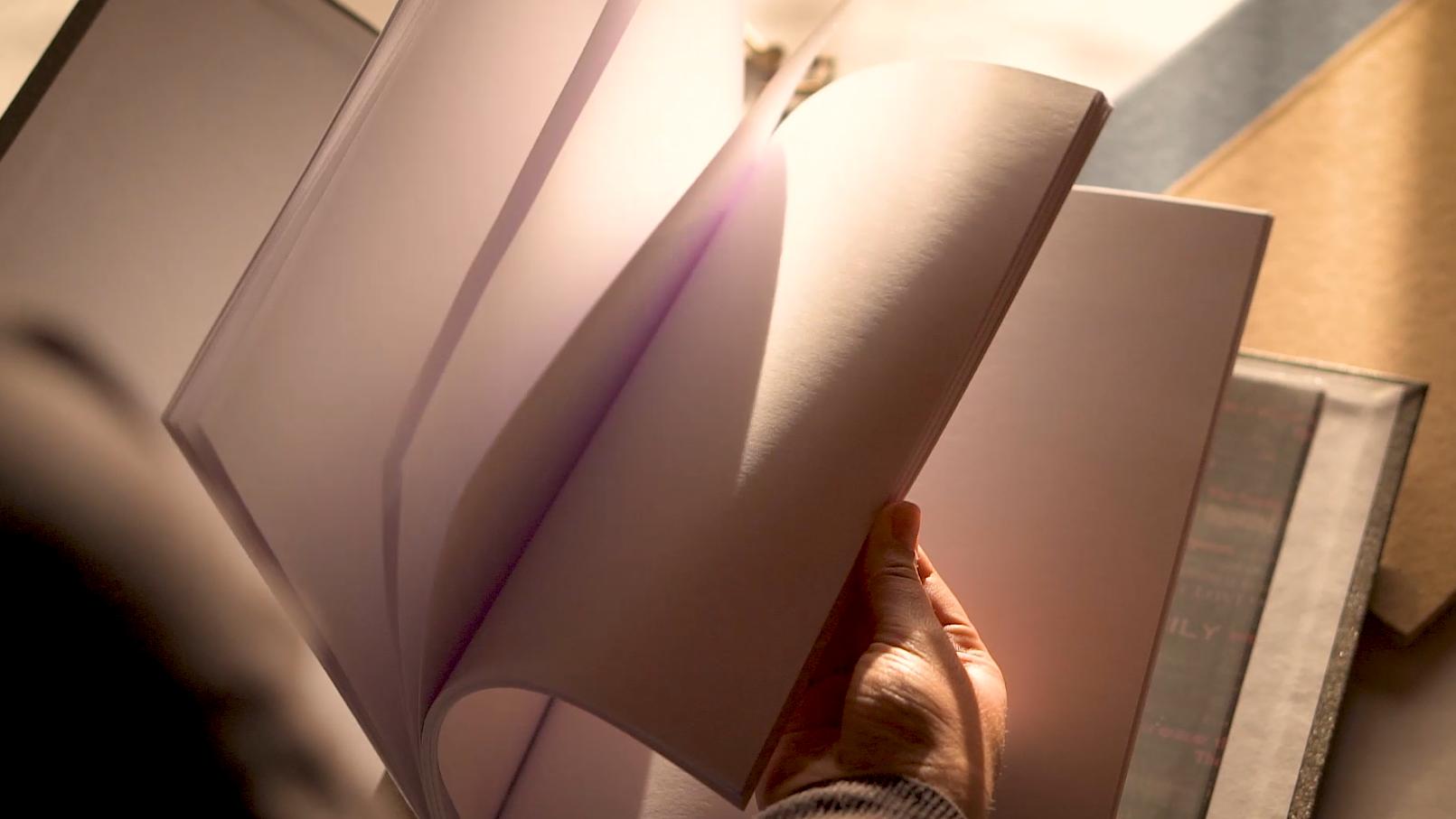 Customized scrapbook with removable pages, designed for flexibility and customization.