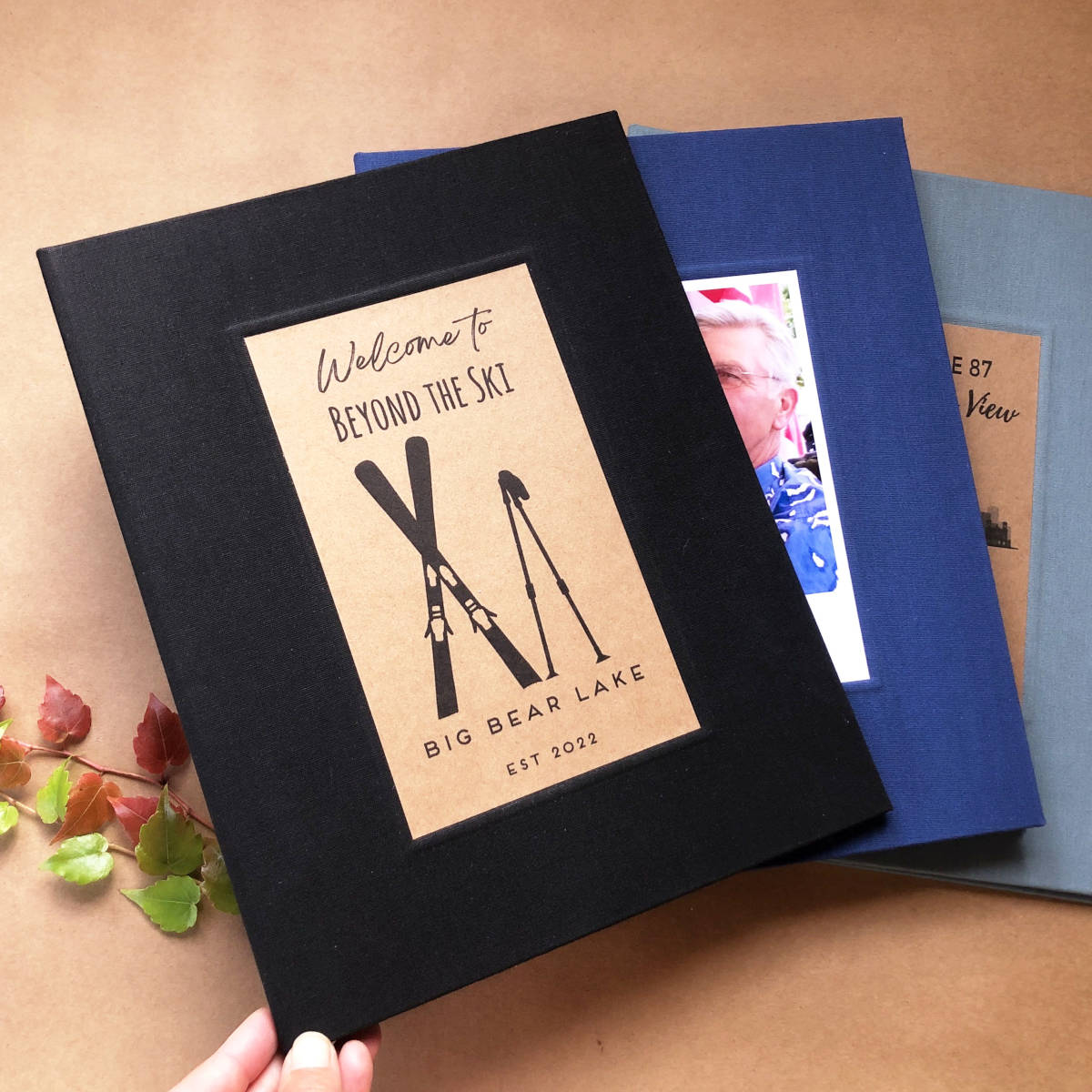 Set of three customizable binders, each uniquely personalized for different short term rental properties.