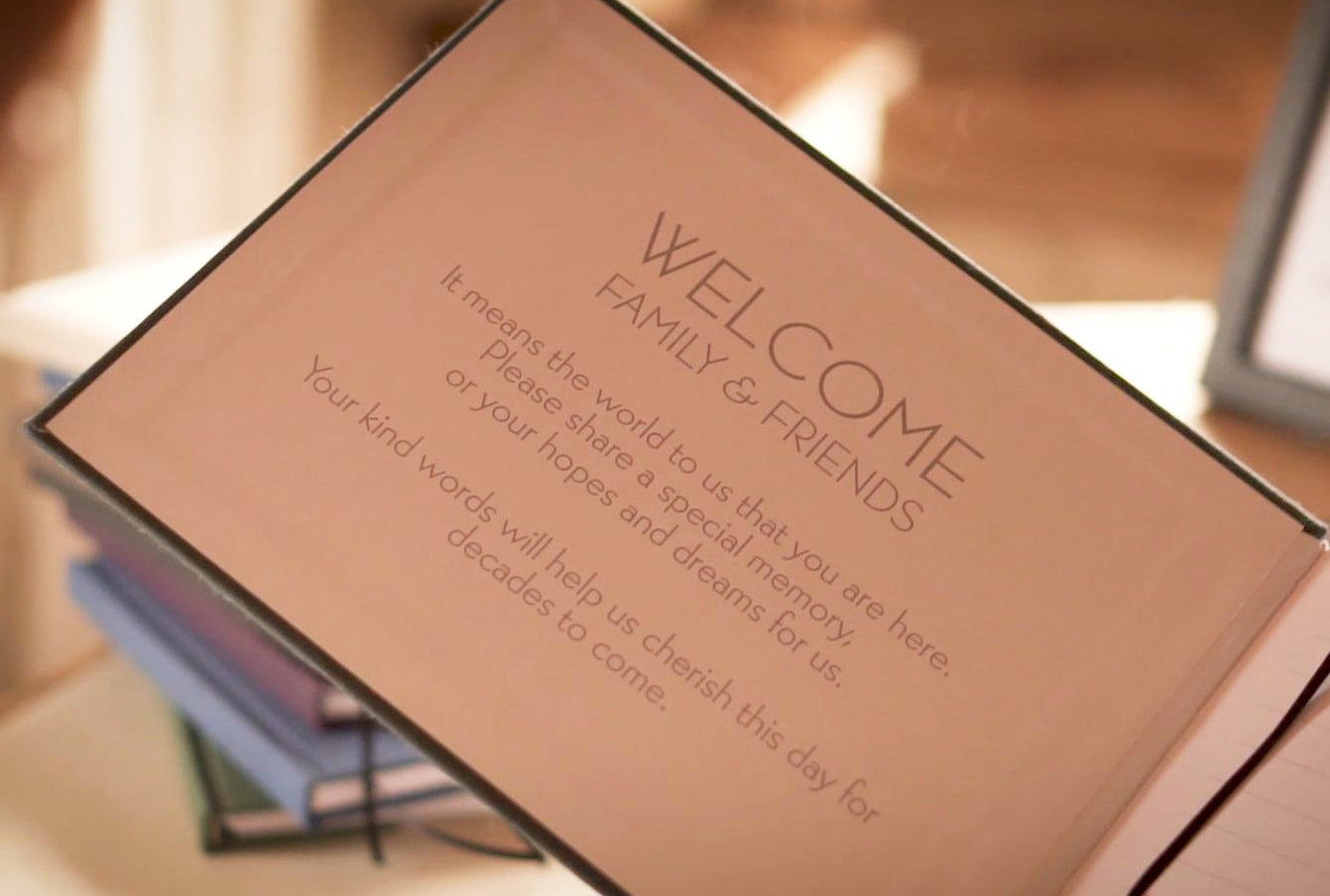 Customizable guest book for a vacation home with a personalized welcome message printed on the inside cover.