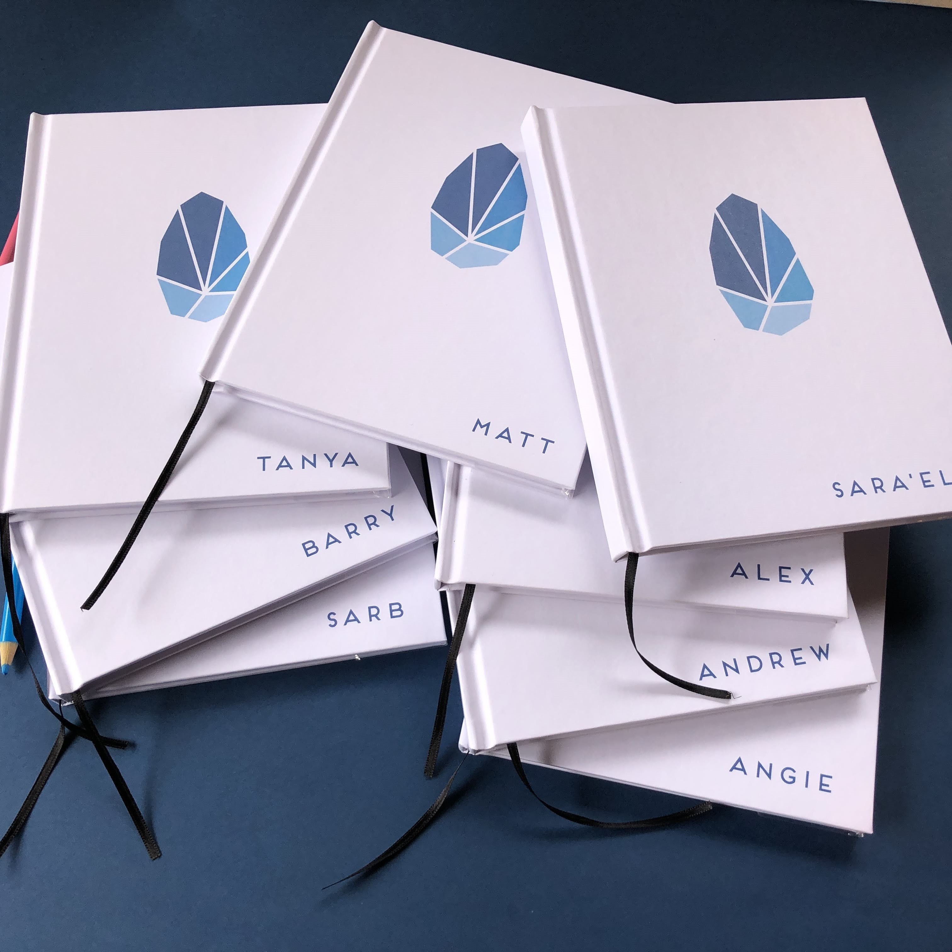 Personalized notebooks in bulk – custom logo notebooks for business branding, conferences, and marketing events.