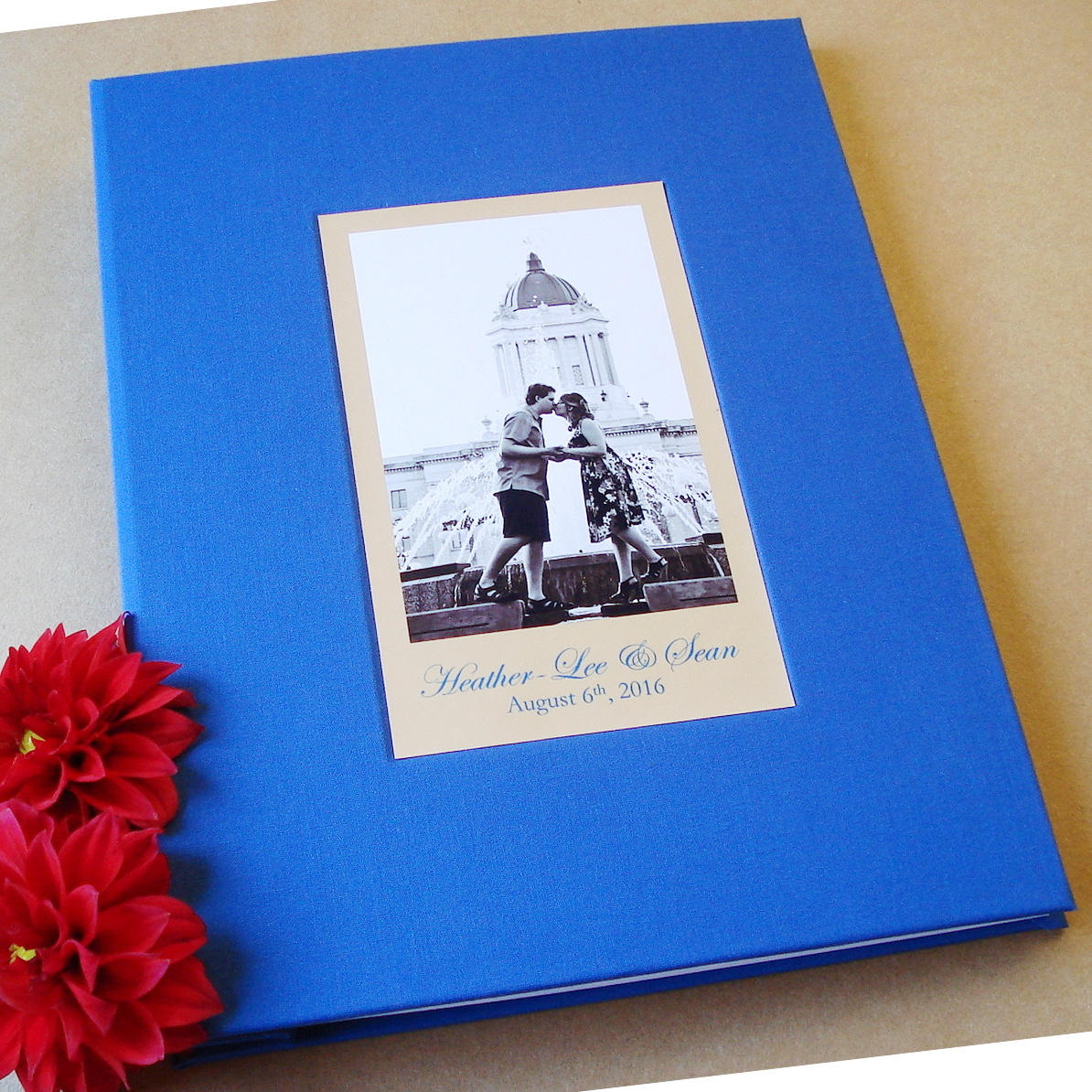 Blue engagement photo album scrapbook with a black and white photo of a couple on a beige background. Removable pages. Hand crafted. Heirloom quality.