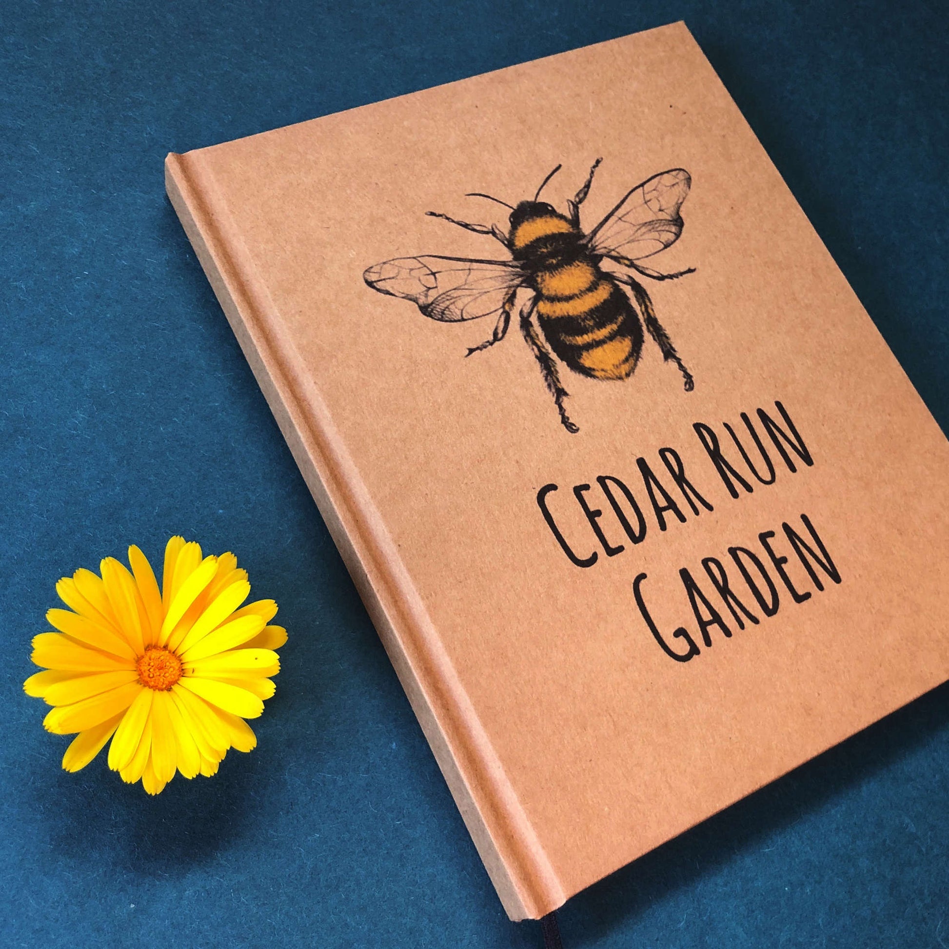 Garden journal personalized with a bee design on the cover. Hardback, handbound, layflat design.