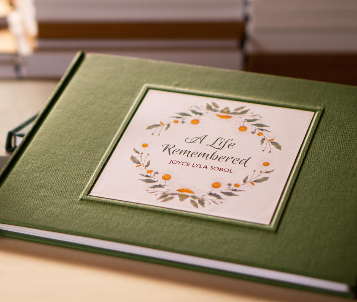 Personalized guest book for a memorial service, featuring a heartfelt tribute on the cover.