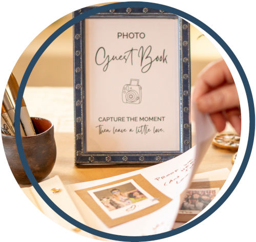 Table sign for a photo guest book on a wedding guest book table.