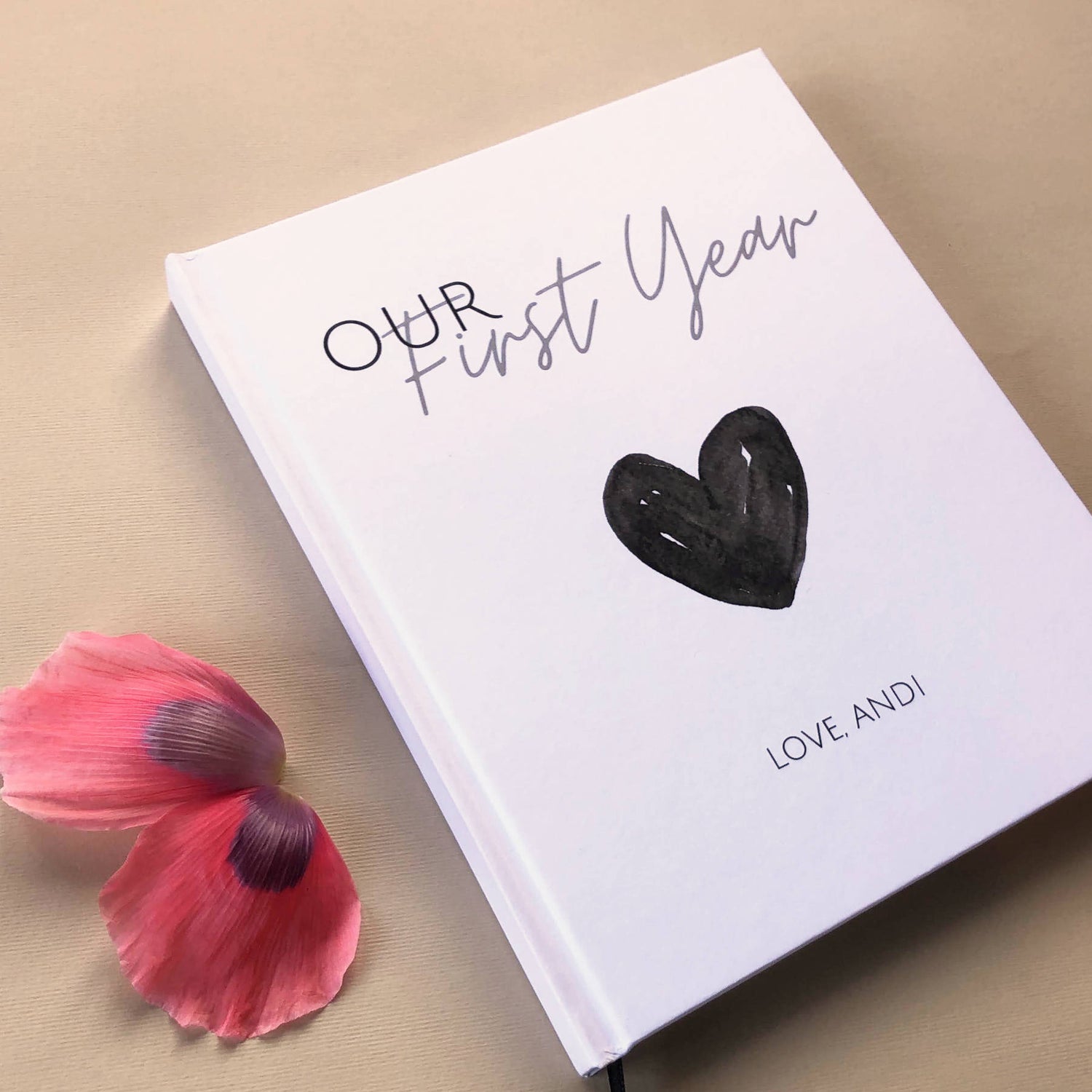 Custom paper anniversary book with hardback  white cover  for gifting to romantic partner.