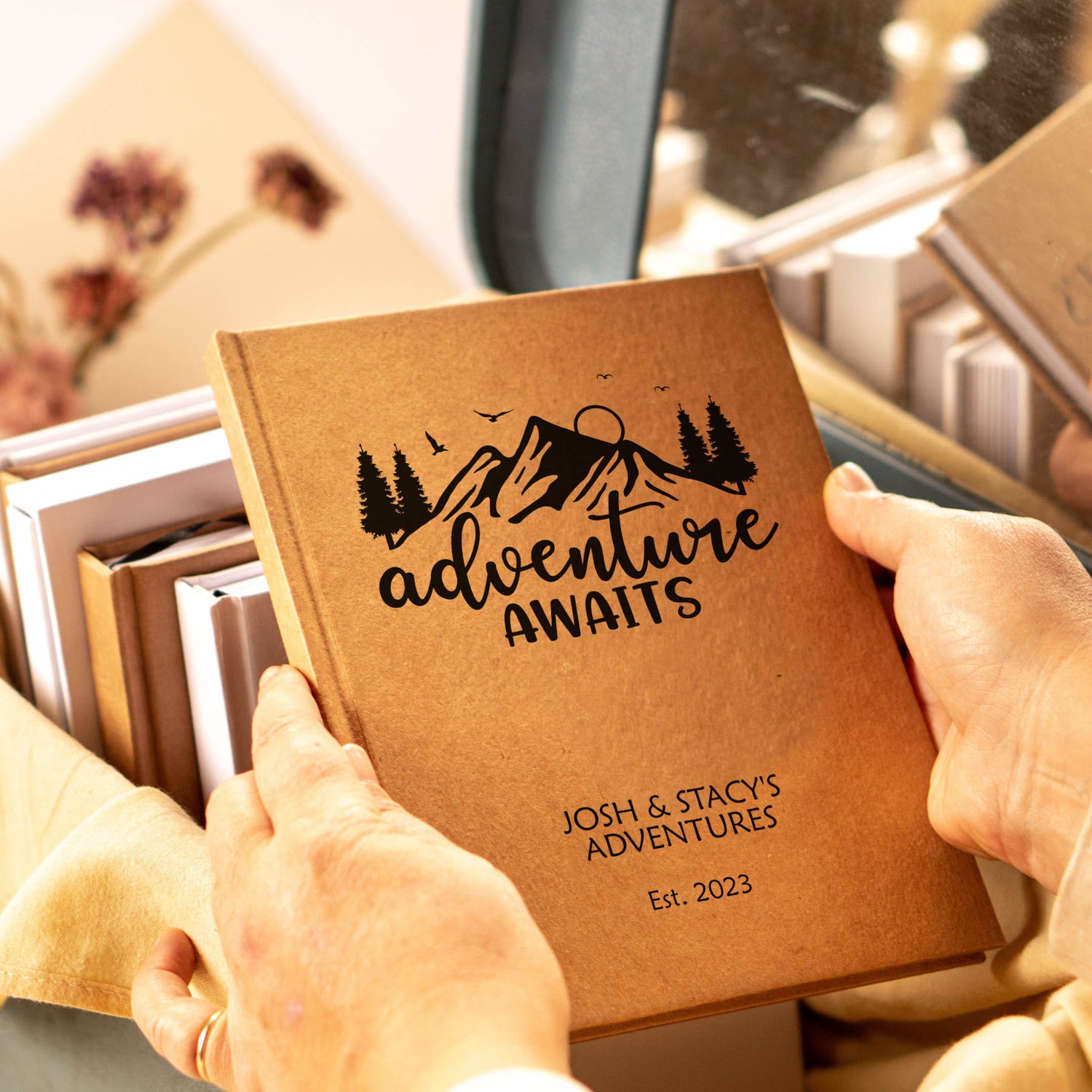 Personalized retirement journal for traveling, with "adventure awaits" artwork on cover.