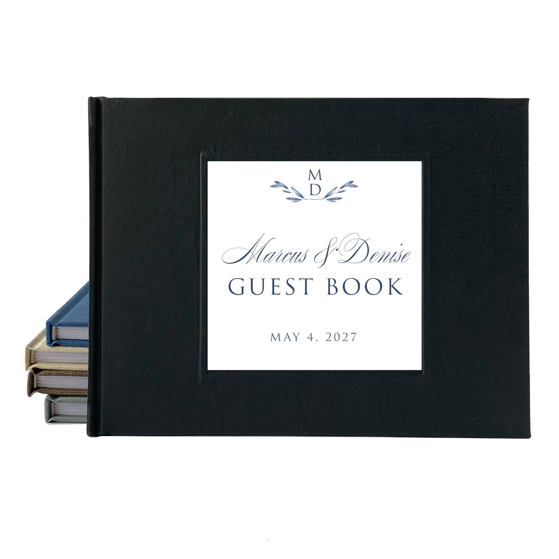 Black linen wedding guest book with personalized title and date in script font on a white background