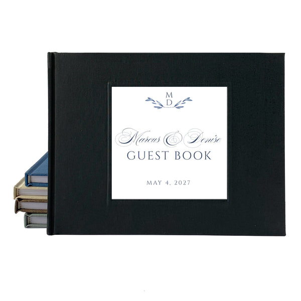 Black linen wedding guest book with personalized title and date in script font on a white background