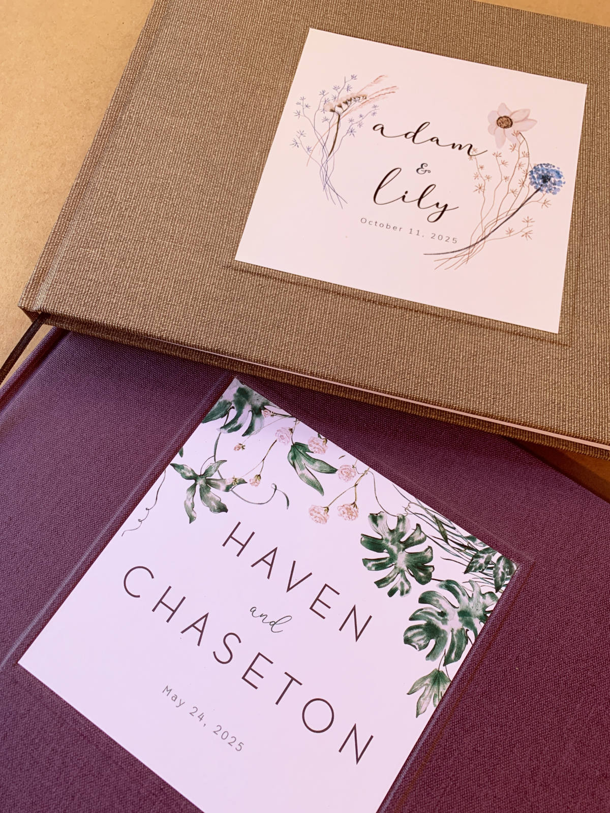 Personalized wedding guest book ideas as unique as your love story. Tropical leaf designs and bohemian dried flower designs. 