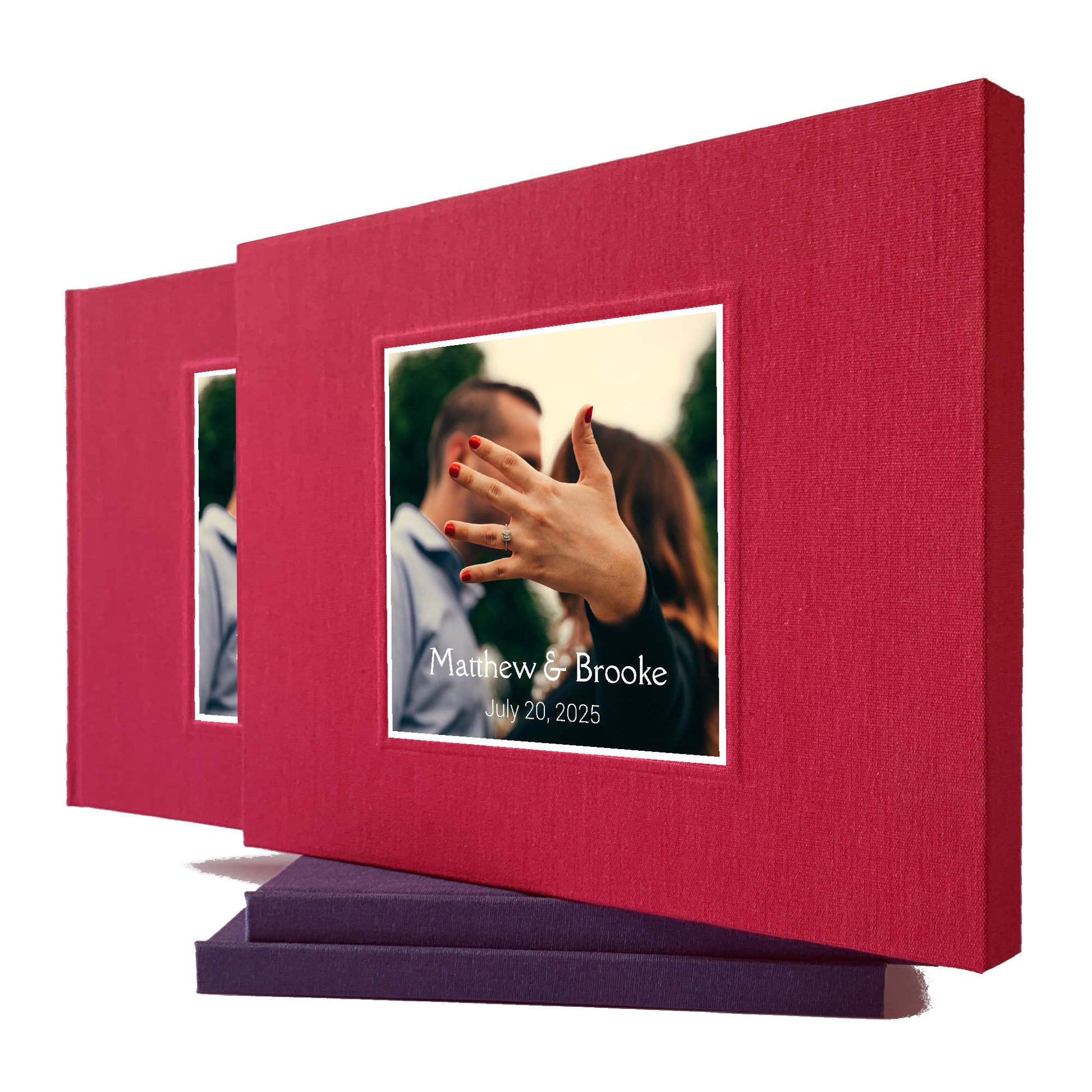 burgundy wedding guest book with engagement photo on the cover housed in a matching book slipcase