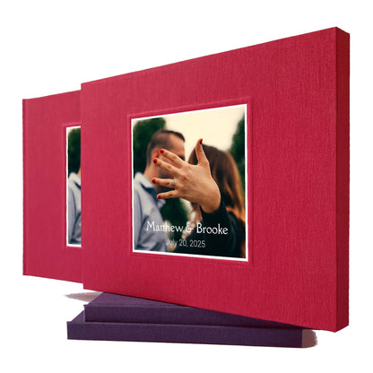 burgundy wedding guest book with engagement photo on the cover housed in a matching book slipcase