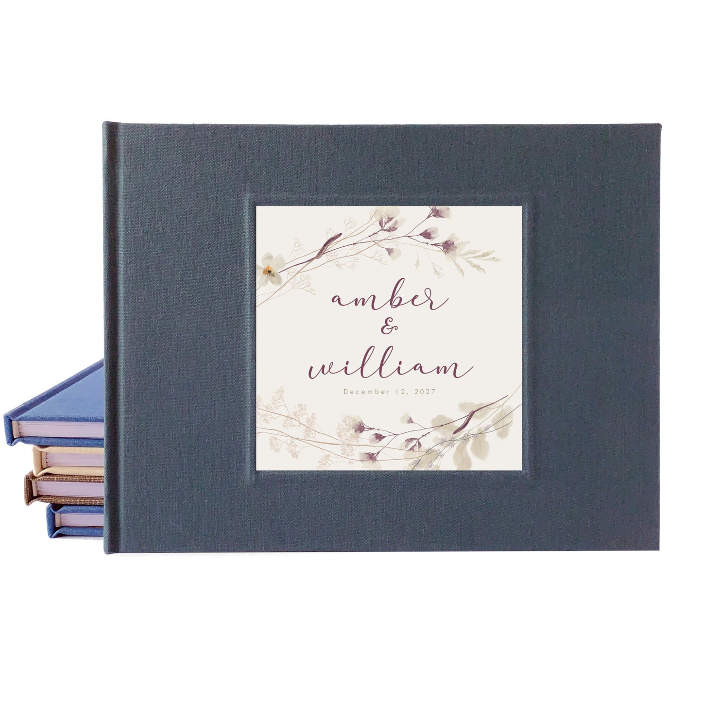 Dark gray linen wedding guest book with personalized rustic plum design o the cover.